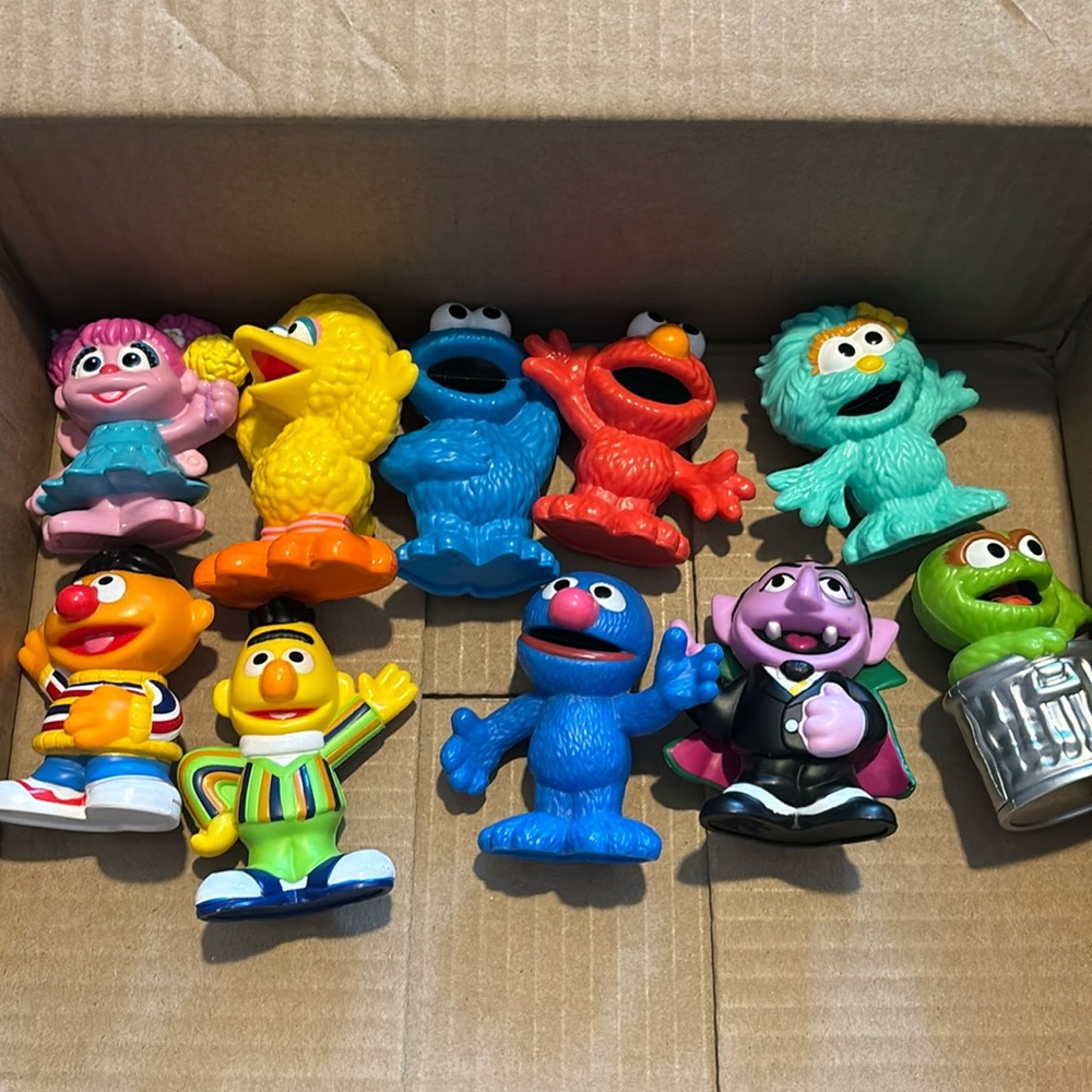 10 piece Sesame Street figures. Excellent condition.